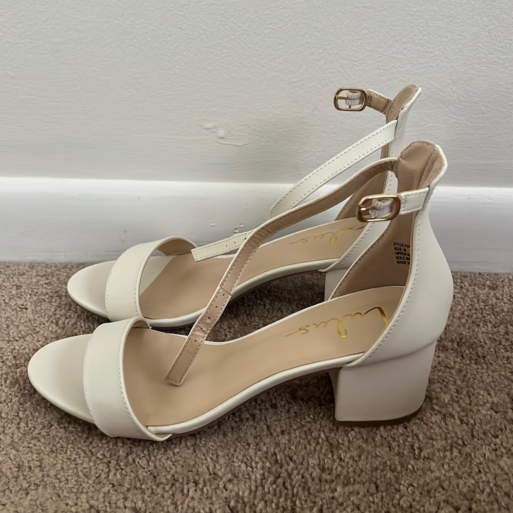 White heels worn once